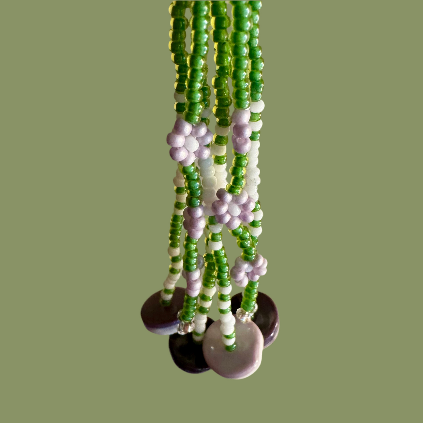 Green Wampum Earrings with Purple Daisies